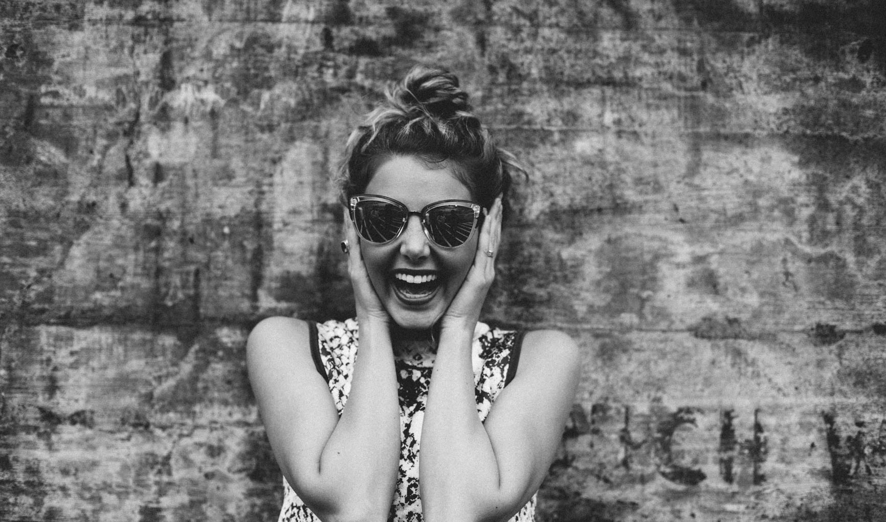 happy woman w sunglasses